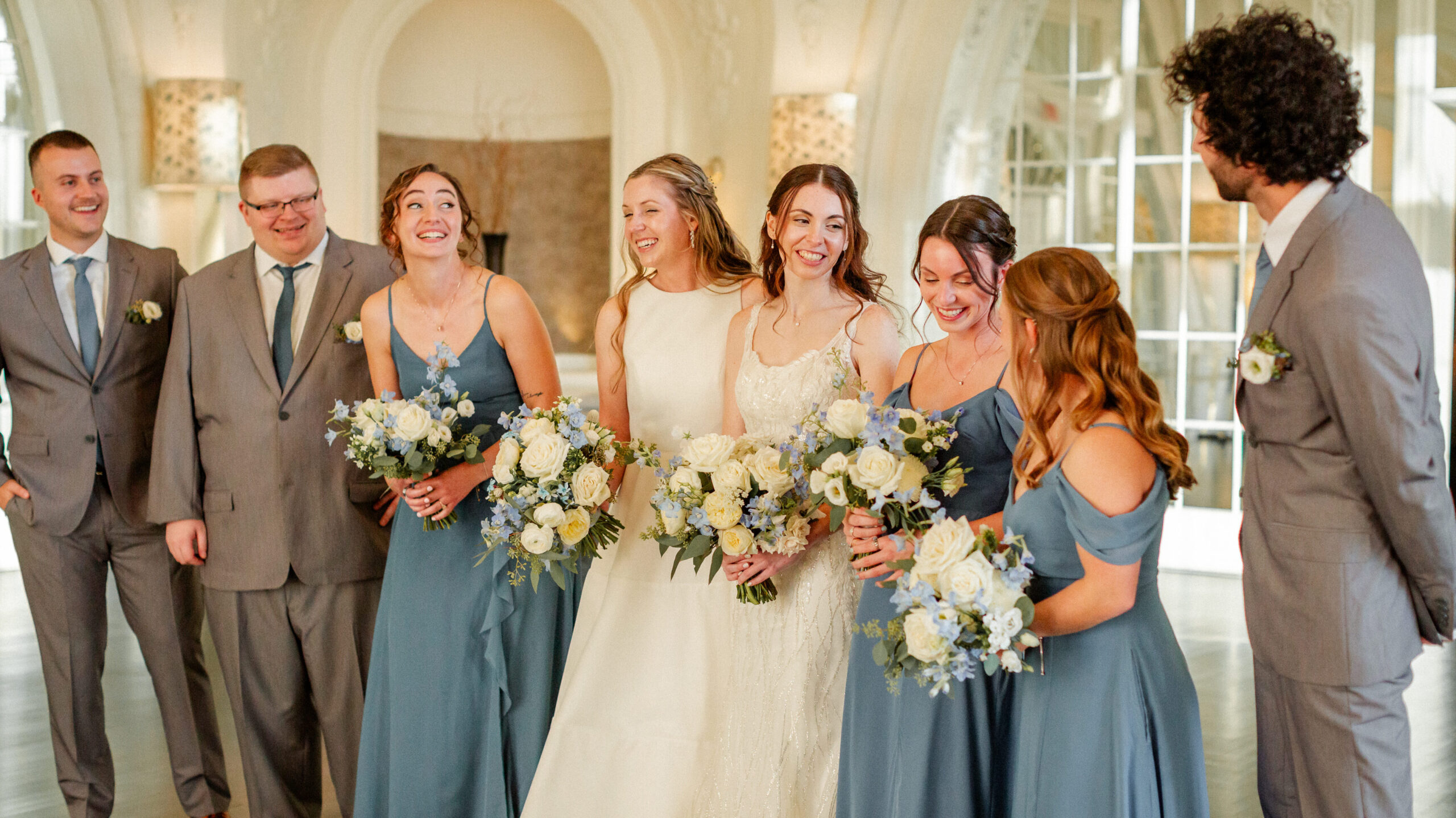 Wandermore Photography 
bridal party, slate blue dresses, blue and white garden style flowers, lisianthus, roses, Bellevue hotel, Philadelphia wedding, garden florals by Leigh Florist design studio Audubon NJ 